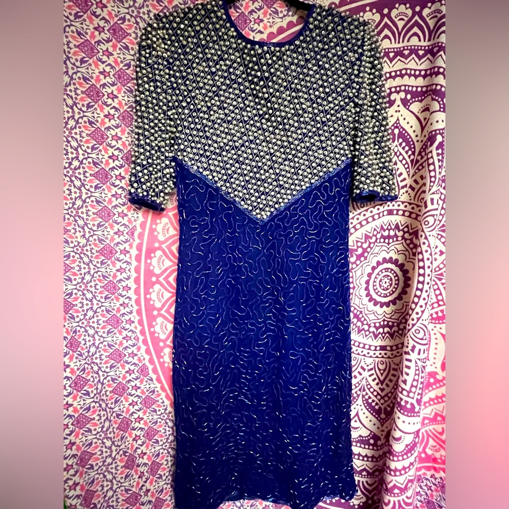 Beautiful vintage dress. Please see photos for imperfections.